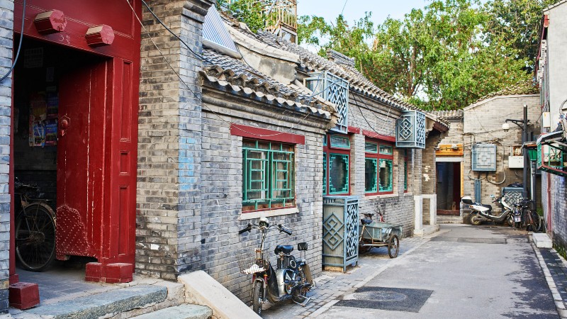 gamle bygg i Beijing med trange gater, sm� hus og med flotte utsmykninger